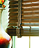 Stained wood blinds with fabric tape